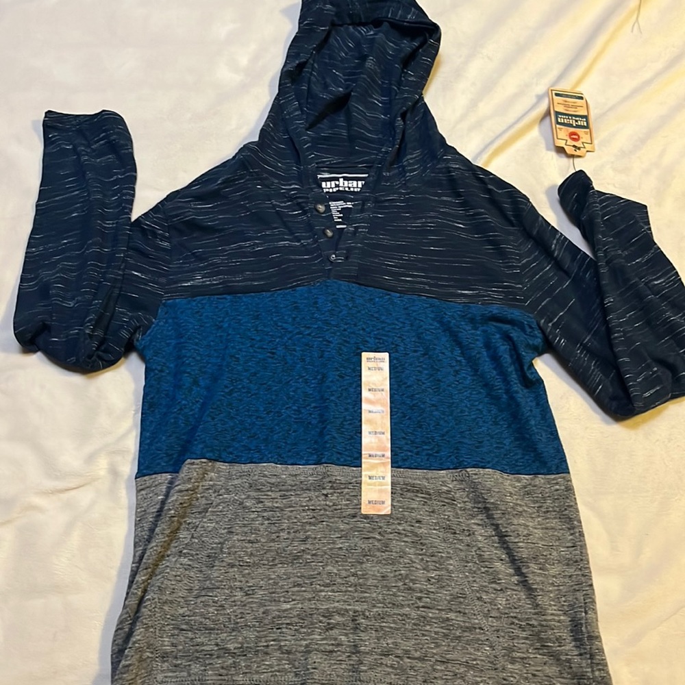 Long sleeve shirt with hoodie.